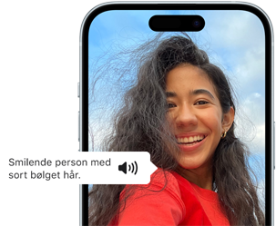 iPhone 15 - smilende person med sort bølget hår