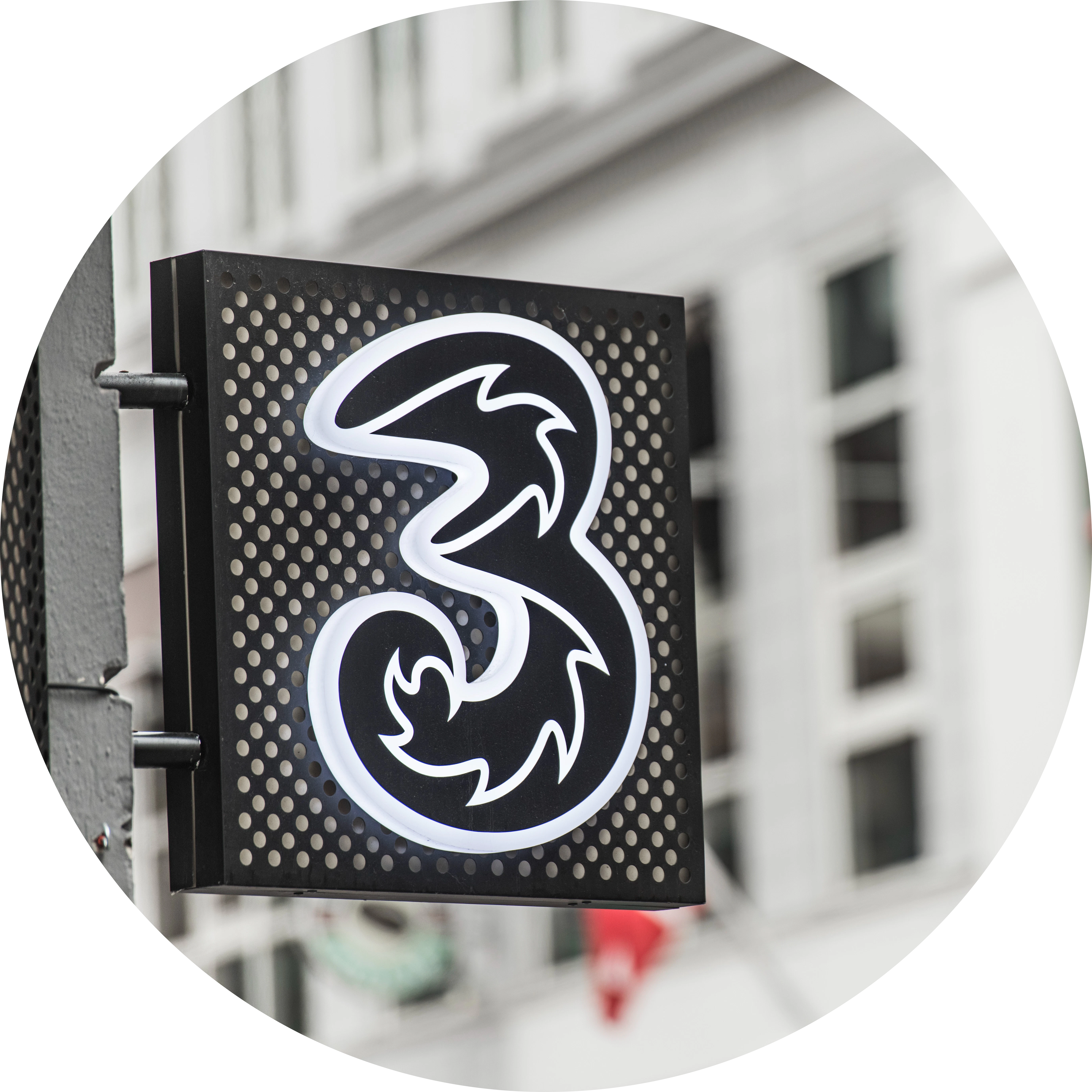 3-logo på en 3-butik