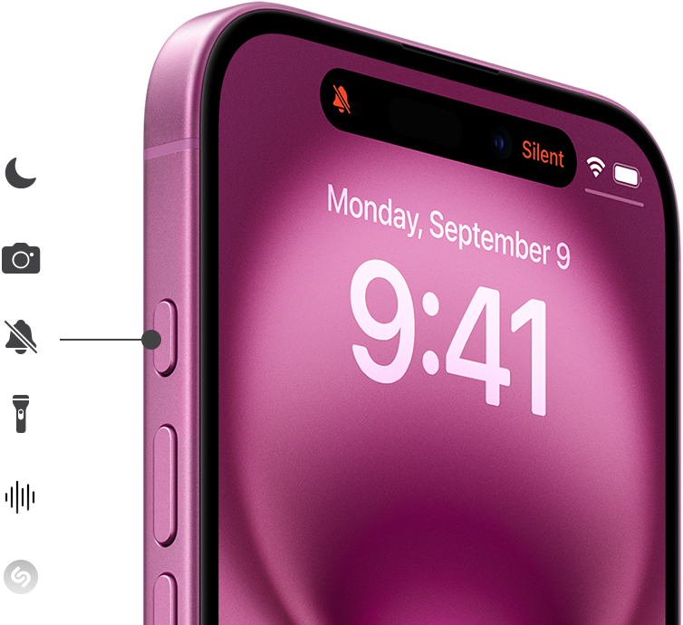 Billedet viser en halv mobil fra midt til top iPhone 16 i lyserød nuance. Skærmbilledet viser skærmlåse med klokkeslag, ude på venstre side af mobilen. bliver der vist sex ikoner "Nattesyn, Kamera, Lydløs, Lydoptager og Shazam ", som illustrerer de er tilknyttet den øverste knap handleknap ude på siden af mobilen.
